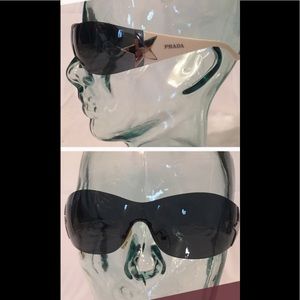 Used Prada sunglasses SPR 72G.